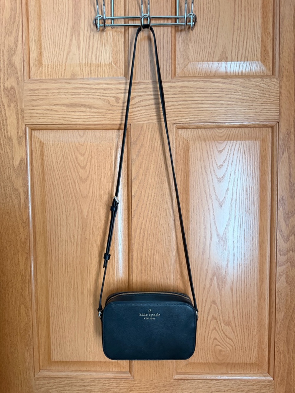 kate spade black crossbody camera purse with gold logo